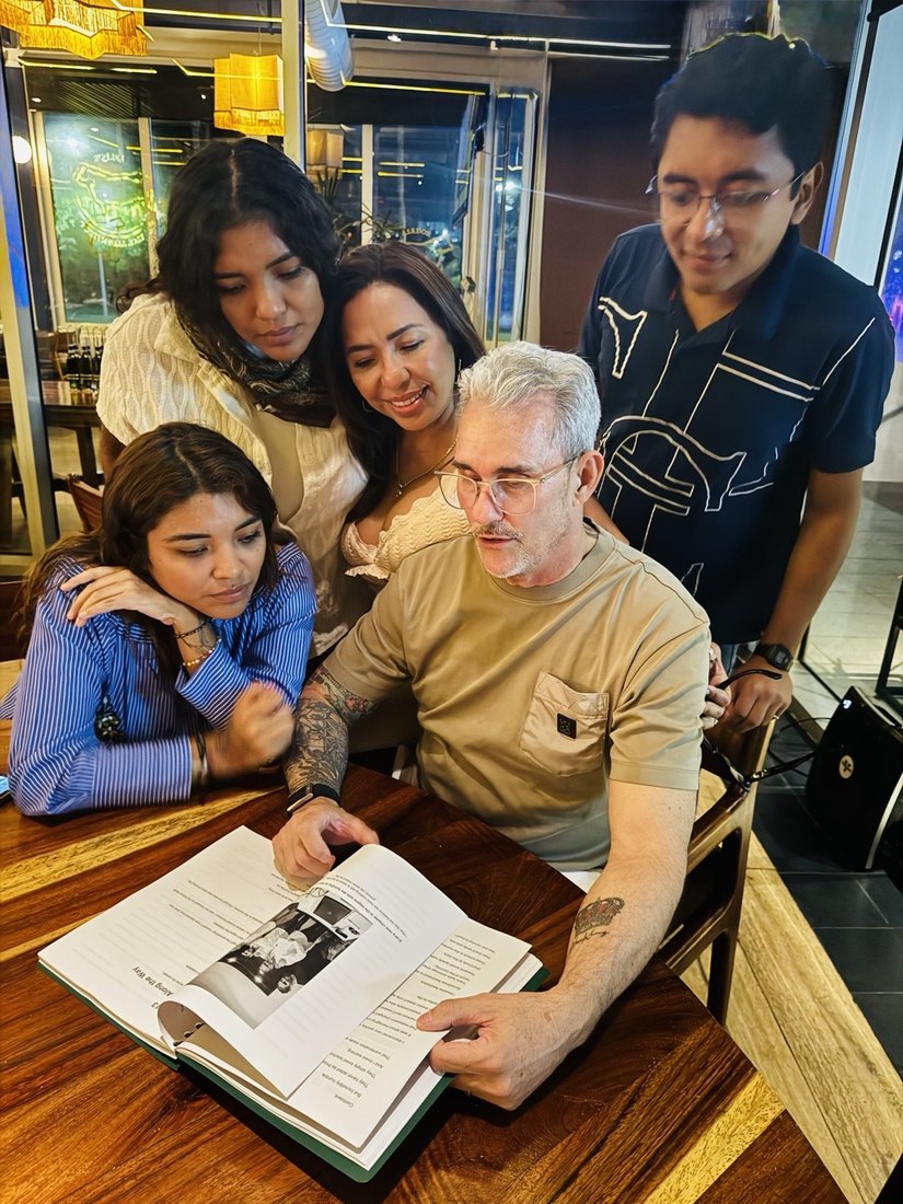 William Shephard sharing the manuscript with family